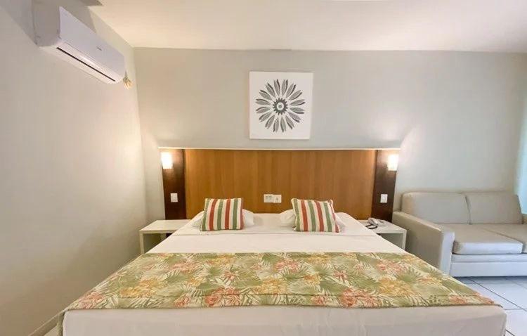 Postel nebo postele na pokoji v ubytování Buzios Beach Resort