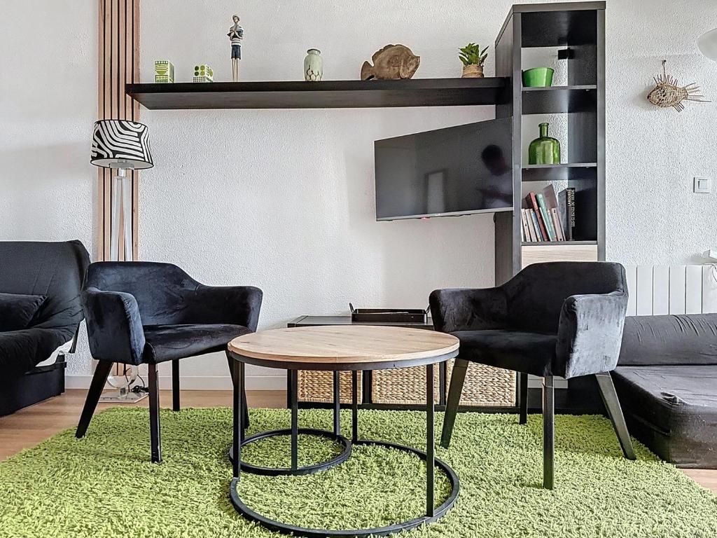 Χώρος καθιστικού στο Le côté Sud de Canet by Alto Service