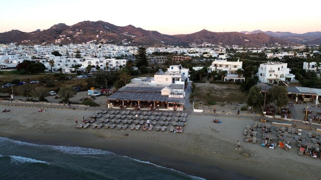 an aerial view of a beach with a resort at Infinity Apartments in Naxos Chora
