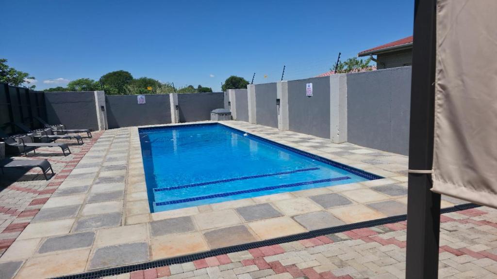 Bazén v ubytování The Residence nebo v jeho okolí