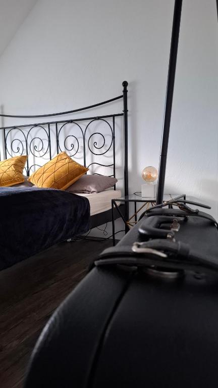 Ένα ή περισσότερα κρεβάτια σε δωμάτιο στο CityStay Wolfsburg - GTI