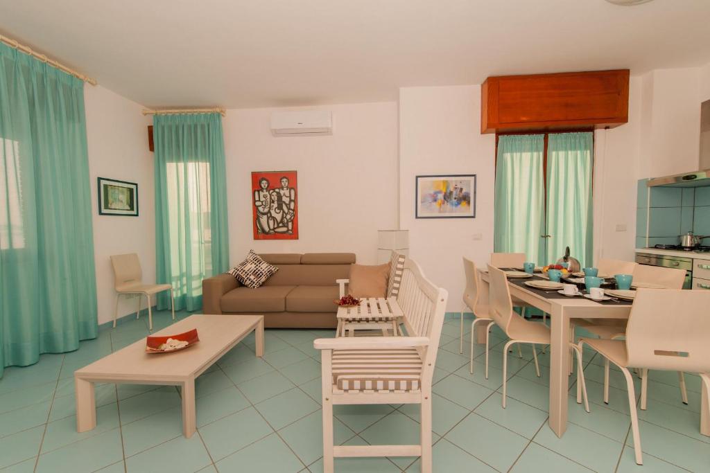 Restoran atau tempat lain untuk makan di Capri Apartment