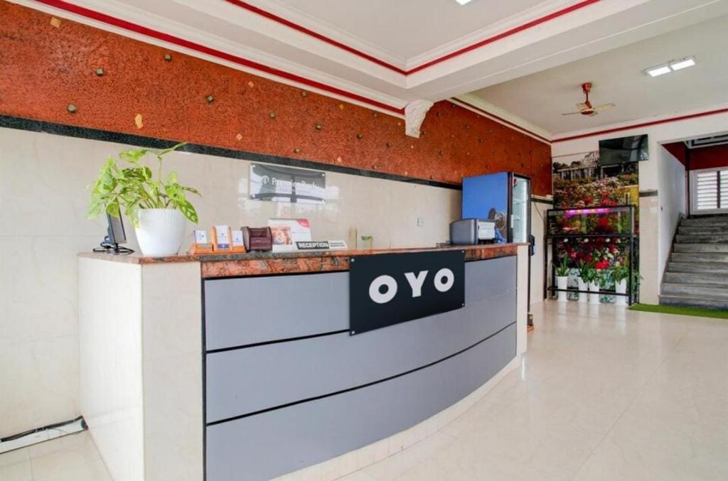 an office with a yes sign on a counter at Exclusive Premier Park Tvm in Trivandrum