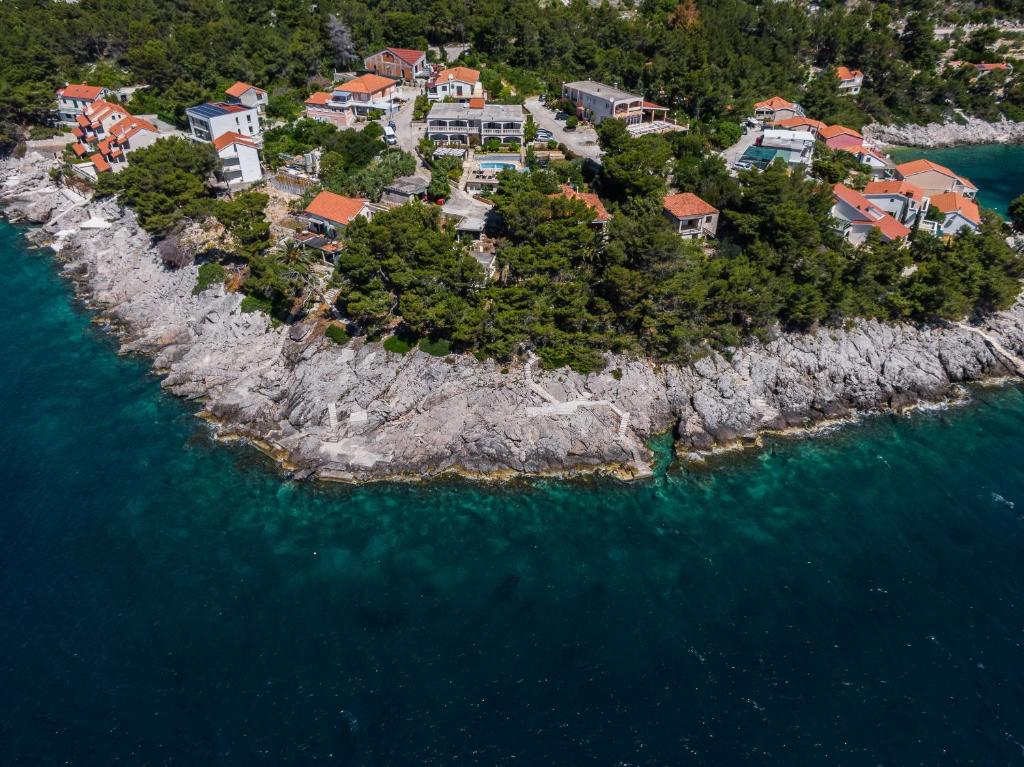 an aerial view of an island in the ocean at Seaside apartments with a swimming pool Prizba, Korcula - 10056 in Brnistrova