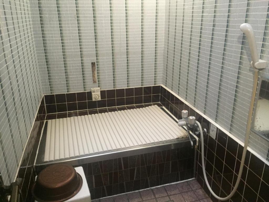 Koupelna v ubytování Takeyaso Ryokan