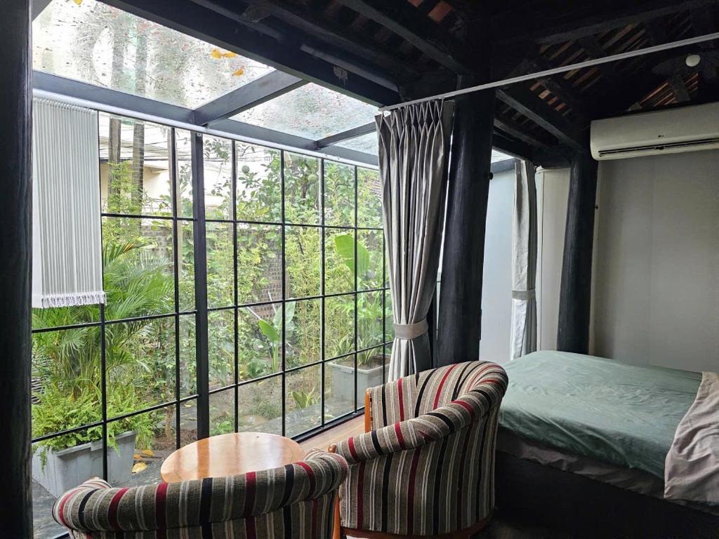 Posezení v ubytování Traditional Wooden House