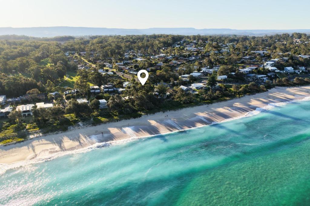 an aerial view of a beach with a heart on it at The Blue Beach House - Pet Friendly Coastal Escape in Mollymook in Mollymook