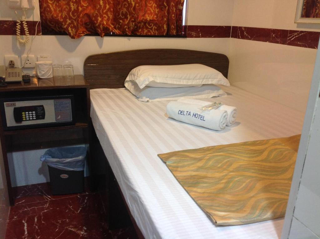 Postel nebo postele na pokoji v ubytování Woodstock Hostel