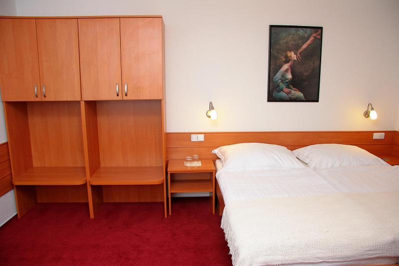 Postel nebo postele na pokoji v ubytování Penzion Bocheta