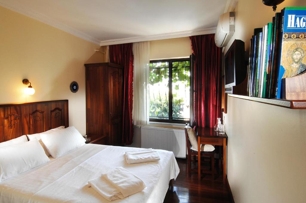 Postel nebo postele na pokoji v ubytování Şebnem Hotel