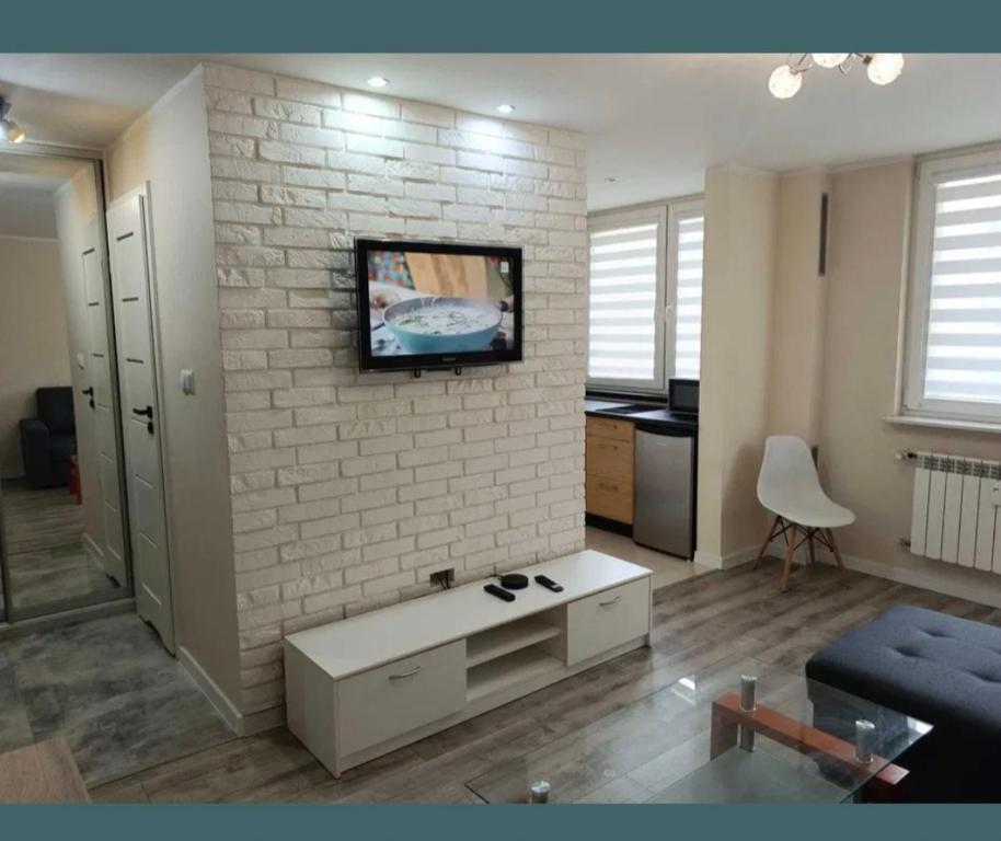 TV a/nebo společenská místnost v ubytování Apartament nad Potokiem