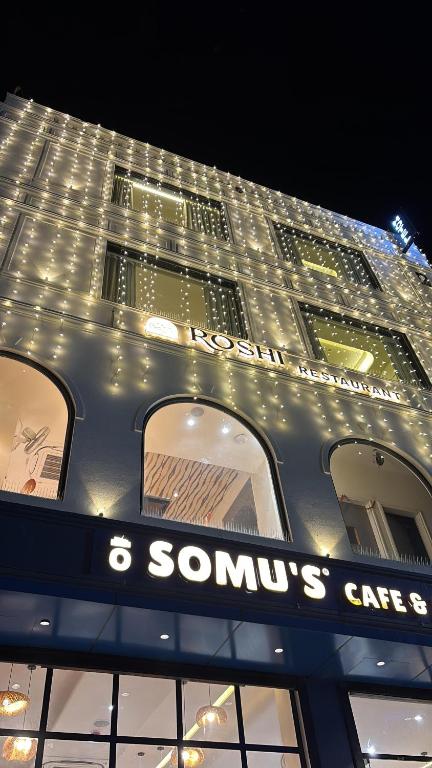 a building with a sign on the side of it at Hotel ARCHWAY By SOMU'S PRIMS in Jaipur