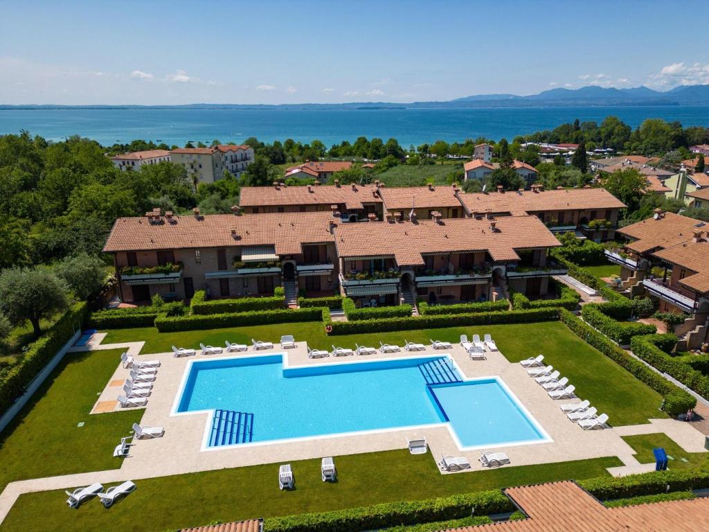 an aerial view of a villa with a swimming pool at Amazing holiday home in Lazise with swimming pool in Lazise