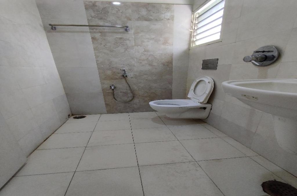 Koupelna v ubytování Sri SUBHAMASTHU GRAND