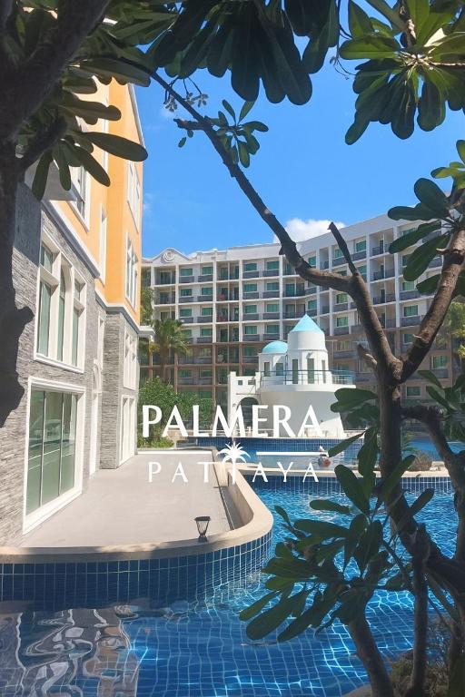 a view of a cruise ship in a pool at a resort at Arcadia Beach Continental By Palmera Pattaya in Pattaya South