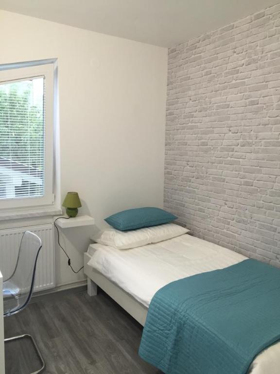 Postel nebo postele na pokoji v ubytování Isabella Rooms