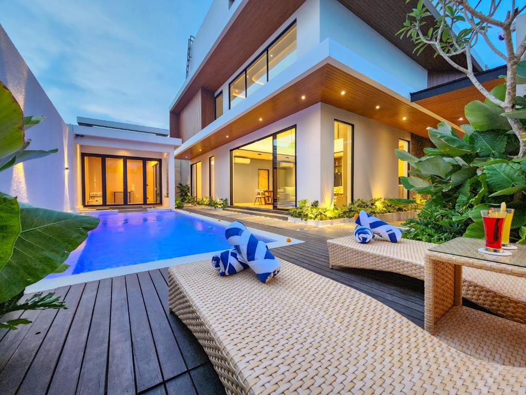 Πισίνα στο ή κοντά στο Casa Verano Jimbaran by Nagisa Bali