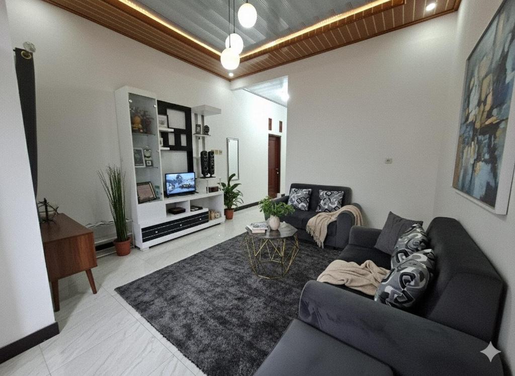 TV a/nebo společenská místnost v ubytování Homestay Castanea