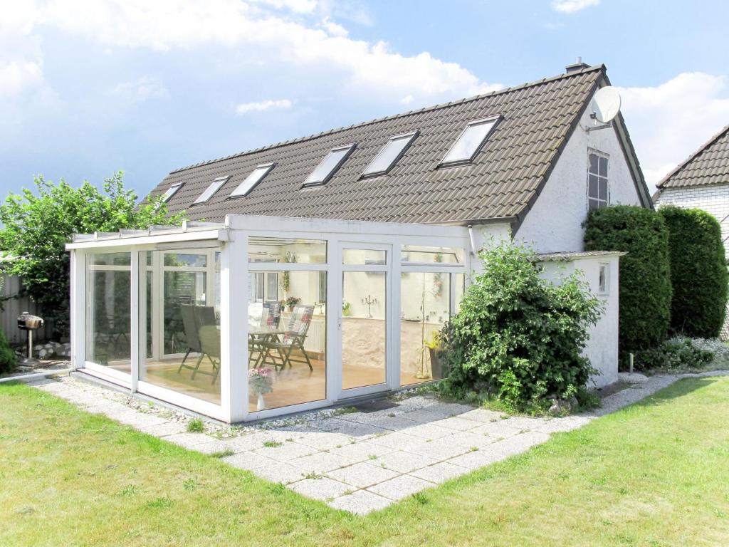 an extension to a conservatory in a house at Holiday Home Am See I by Interhome in Verchen