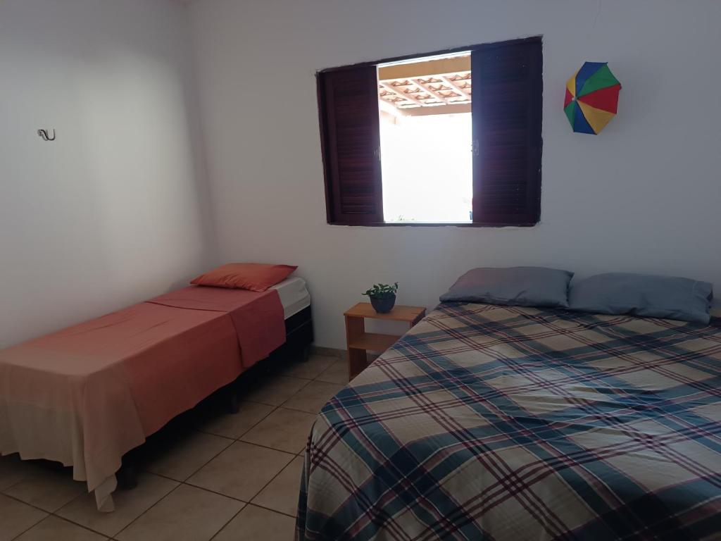 Postel nebo postele na pokoji v ubytování Sol guest house