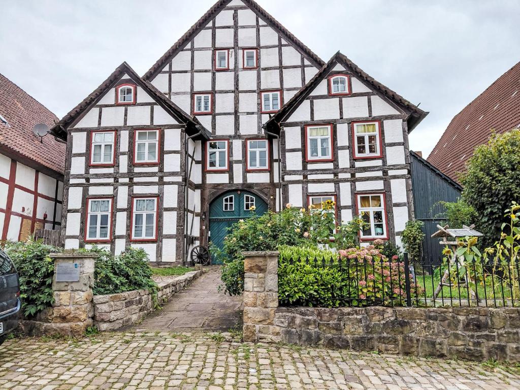 an old house with a cobblestone street at Apartment Schwalenberger Land by Interhome in Schieder-Schwalenberg