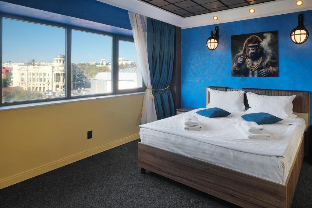 En eller flere senge i et værelse på Lapusneanu Central Apartments