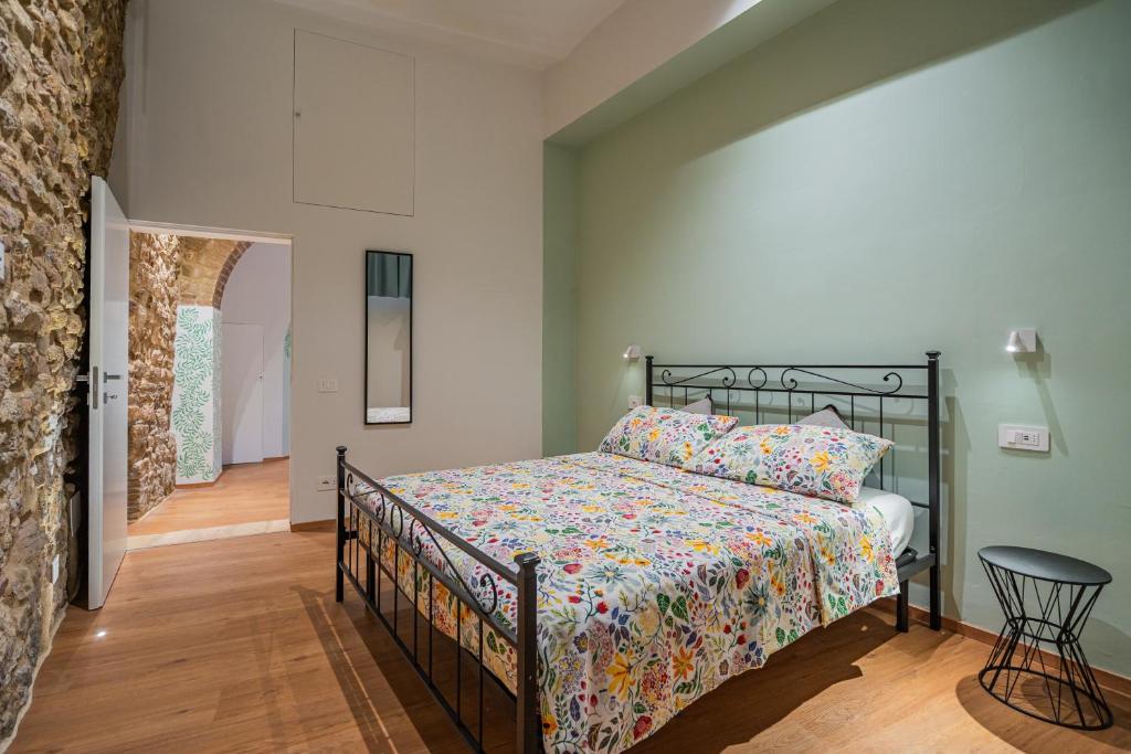 Ένα ή περισσότερα κρεβάτια σε δωμάτιο στο Via della Sposa 35 - ideale per 2 perfetto per 4