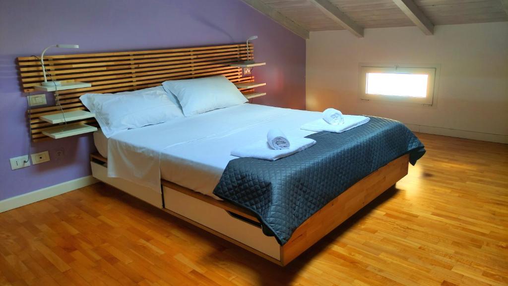 Ένα ή περισσότερα κρεβάτια σε δωμάτιο στο Verona Dreams