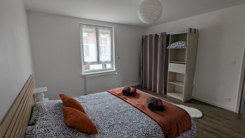 En eller flere senge i et værelse på Appart Épine Strasbourg