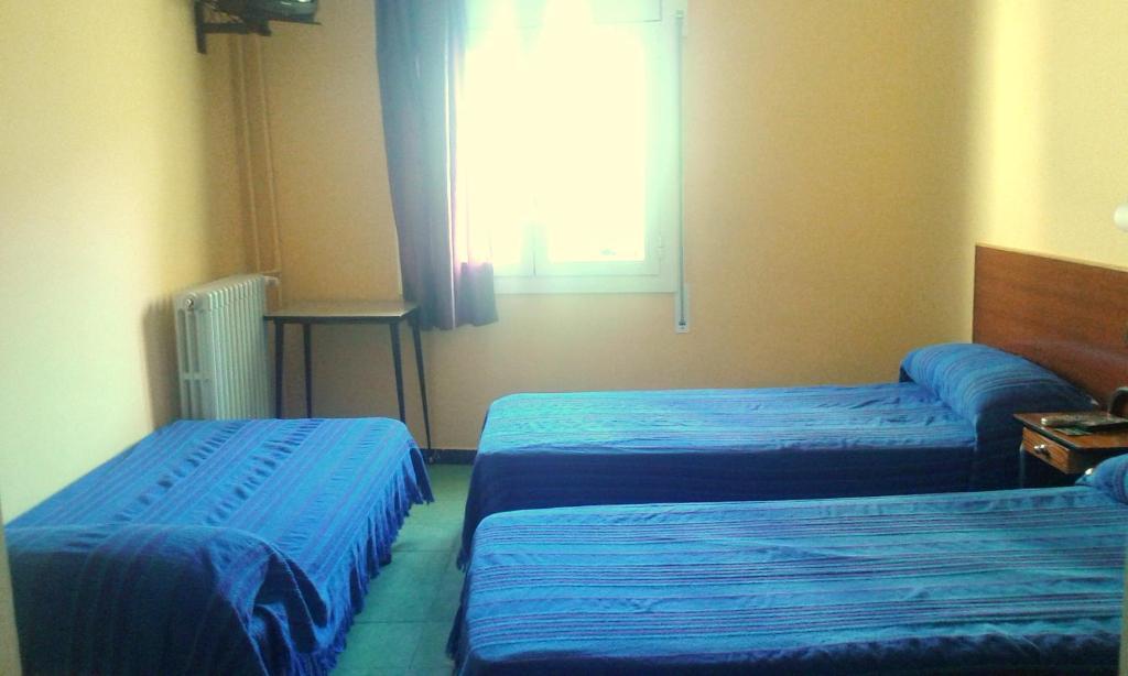 Hostal Urgell - Driepersoonskamer