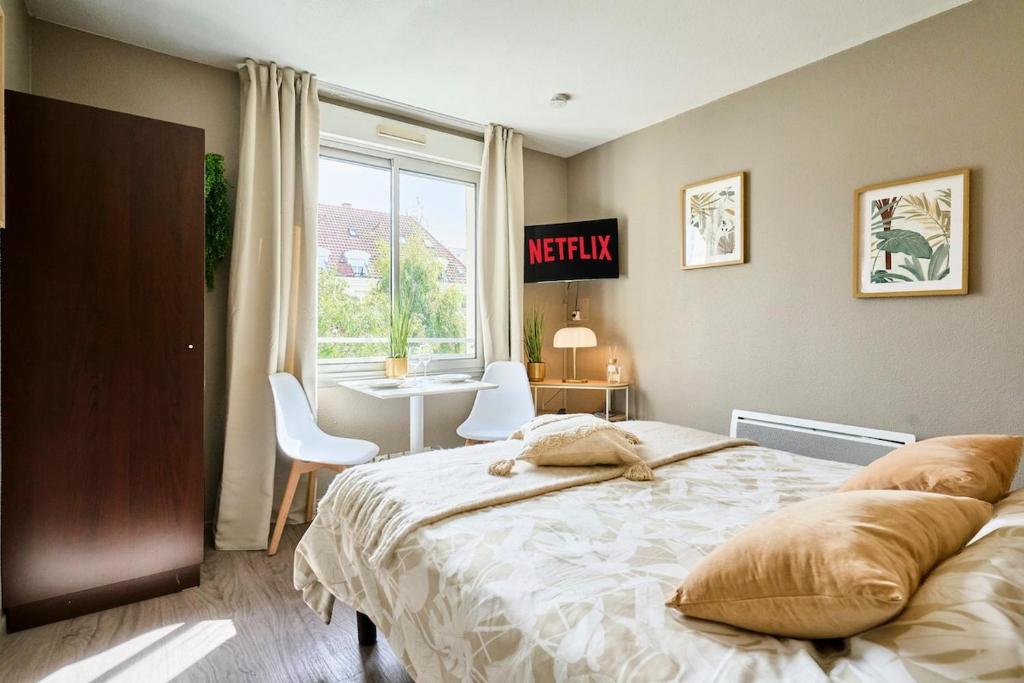 Ένα ή περισσότερα κρεβάτια σε δωμάτιο στο Cozy studio, Vauban in Lille