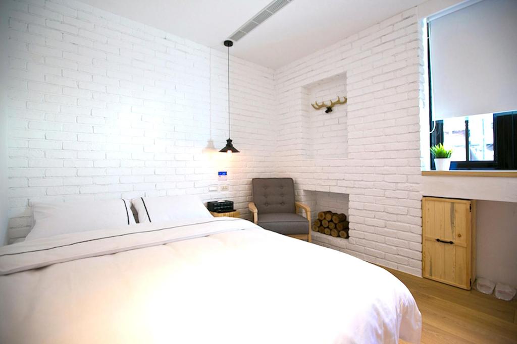 Postel nebo postele na pokoji v ubytování York Hotel