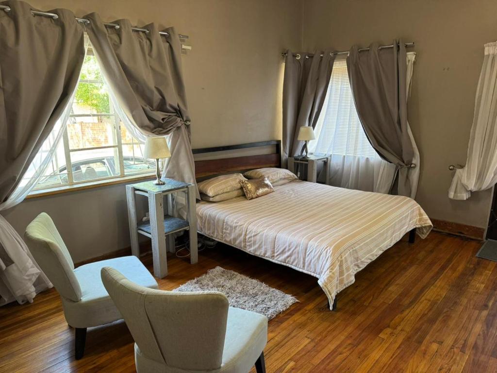 Giường trong phòng chung tại Carmen