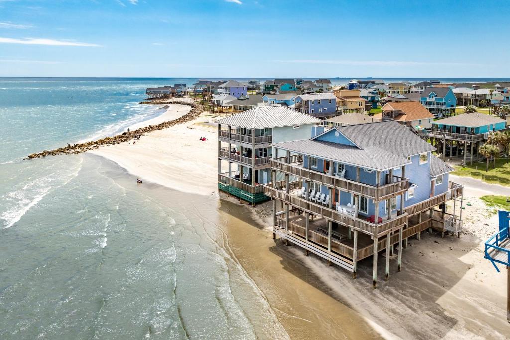 an aerial view of a house on the beach at Atlantis - Oceanfront Seating at its Finest! in Freeport