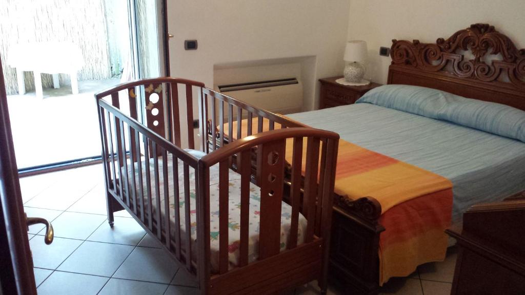 Postel nebo postele na pokoji v ubytování Cartaromana House