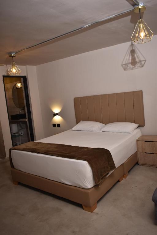 Voodi või voodid majutusasutuse History Center Hotel toas