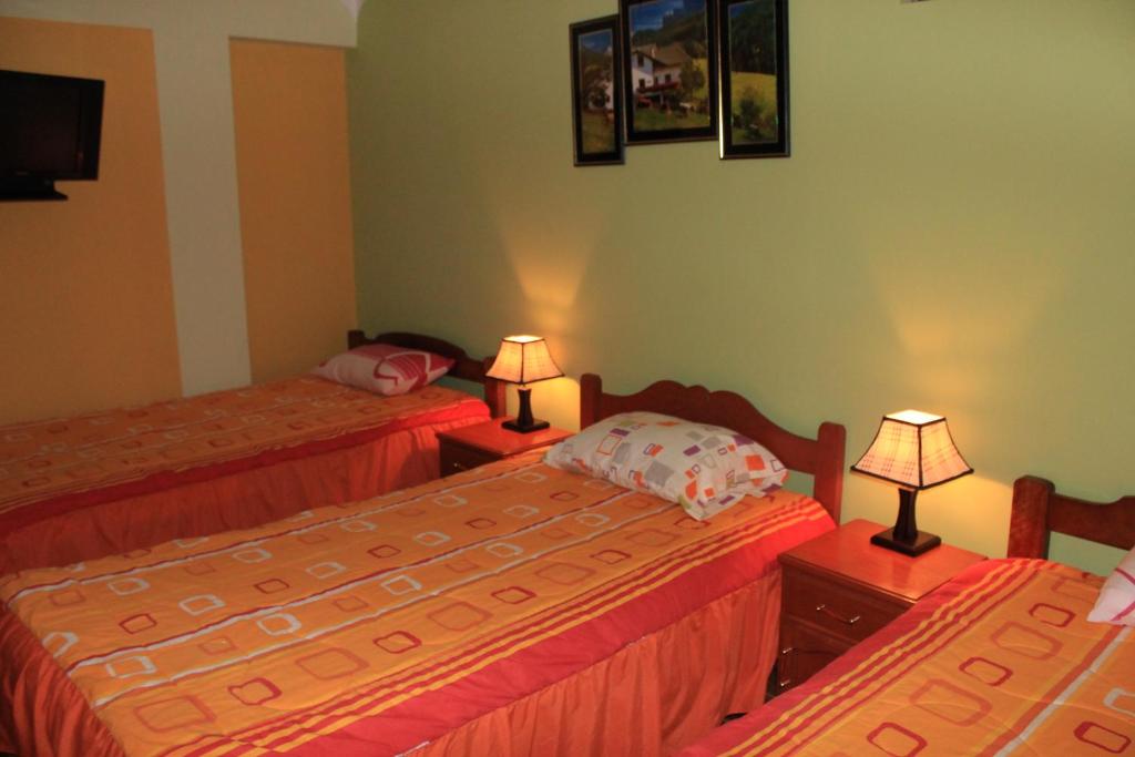 Postel nebo postele na pokoji v ubytování Residencial Norandes