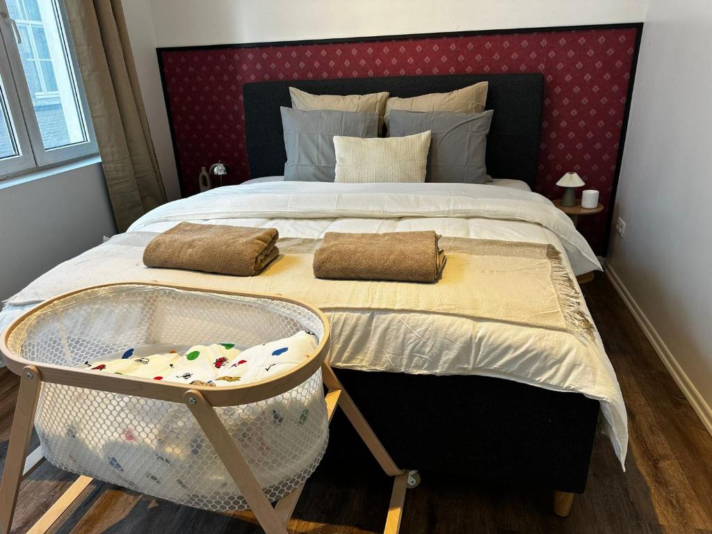 a bedroom with a large bed with a bath tub at Lovely 1BR & 1LR Apartment, Only 15 Min Walk to City Center in Ghent