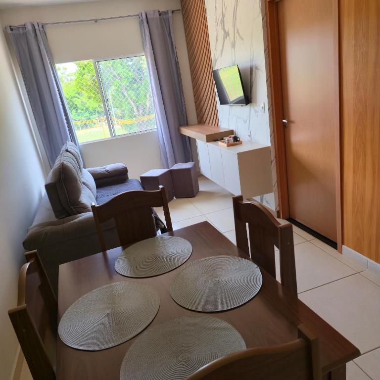 TV a/nebo společenská místnost v ubytování Ap Lagoa da Prata com Ar condicionado