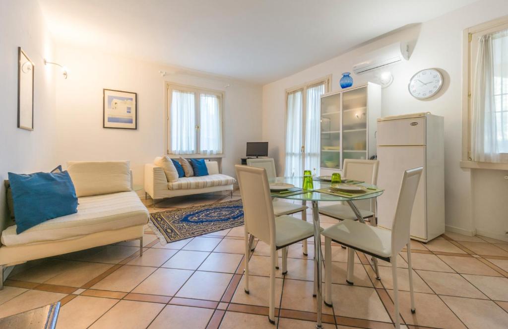 a living room with a table and a couch at Casa Riello in Monte