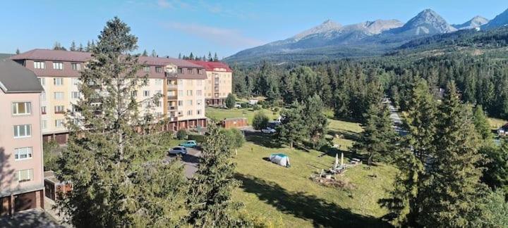 an aerial view of a resort with trees and buildings at Apartmán Líška v Tatranskej Štrbe in Tatranska Strba