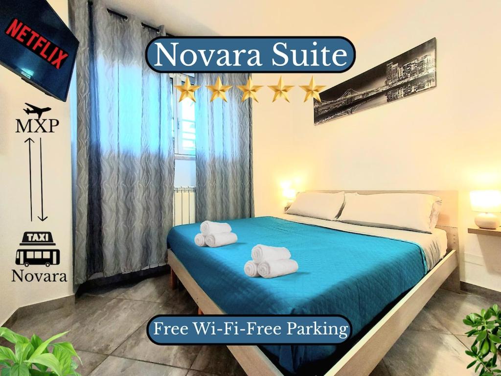 Ένα ή περισσότερα κρεβάτια σε δωμάτιο στο Novara Cozy-Suite