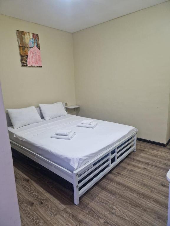 Ένα ή περισσότερα κρεβάτια σε δωμάτιο στο FreshAir Boutique