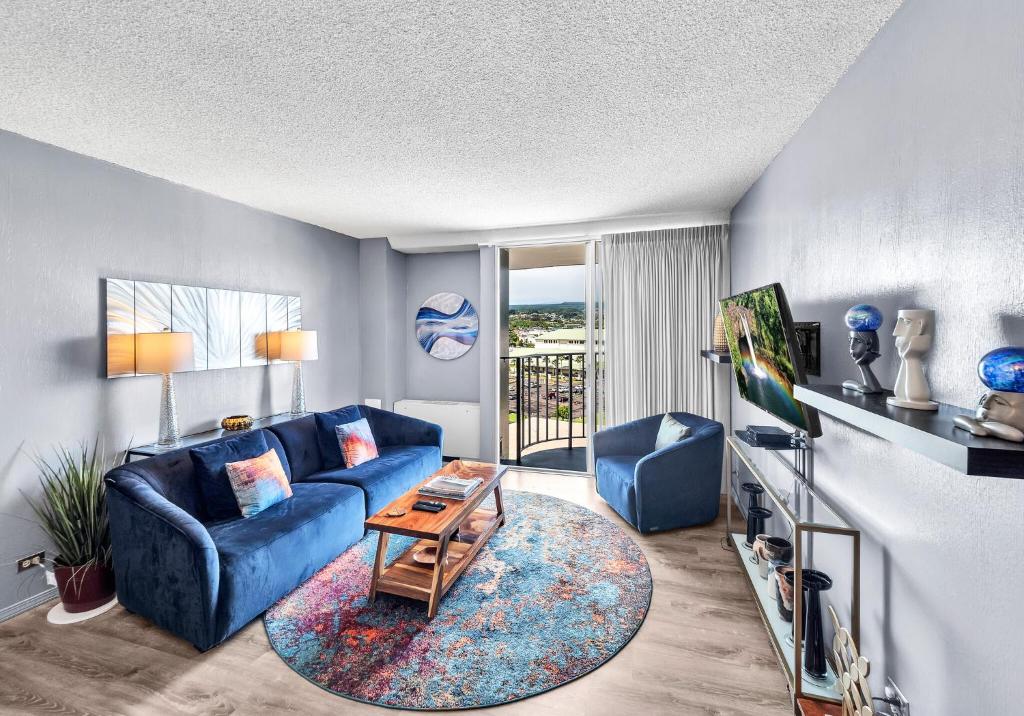 TV a/nebo společenská místnost v ubytování Hilo Lagoon Center #911