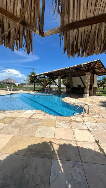 a view of a swimming pool in a resort at Casa Stilo in Aquiraz