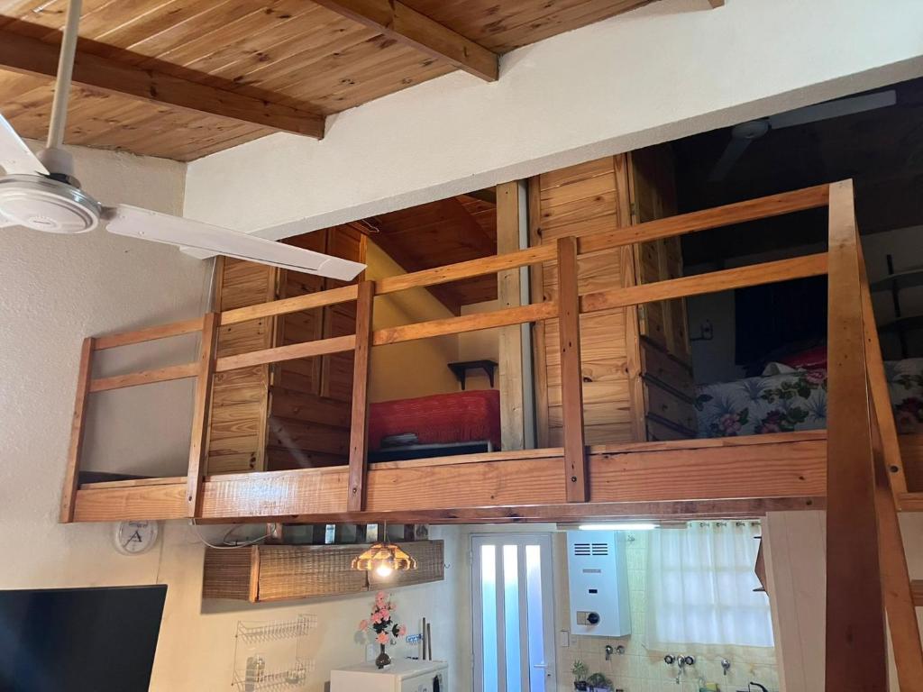 a room with a bunk bed in a room at Departamento céntrico - Cerca de la playa in Monte Hermoso