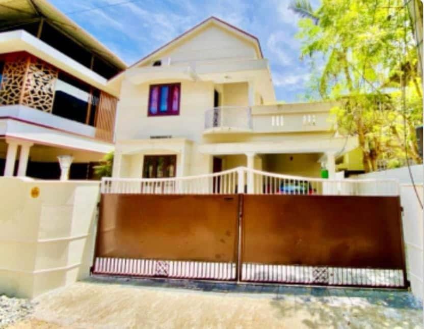 a house with a gate in front of it at Stay with Palee By Casa Paleo in Trivandrum