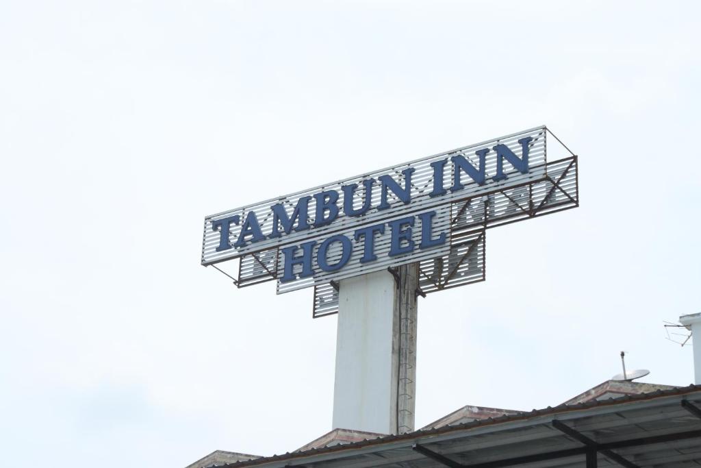 a sign for an akron inn hotel on top of a building at Tambun Inn Hotel in Ipoh