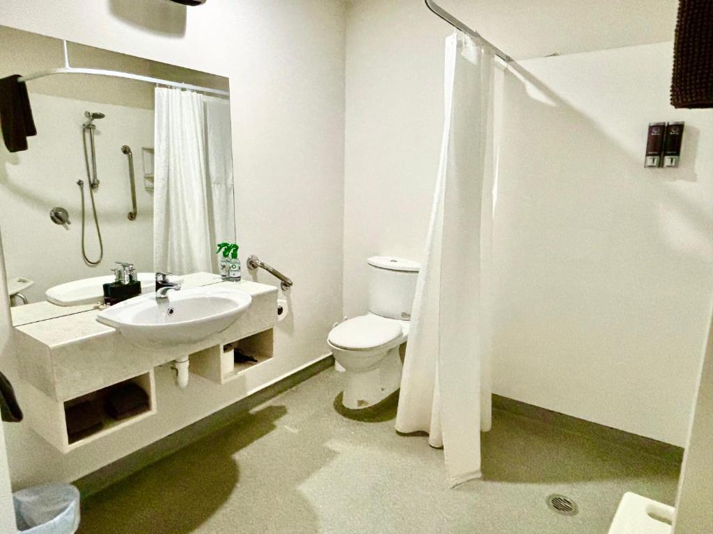 ASURE Phoenix Motor Inn - Resim 39