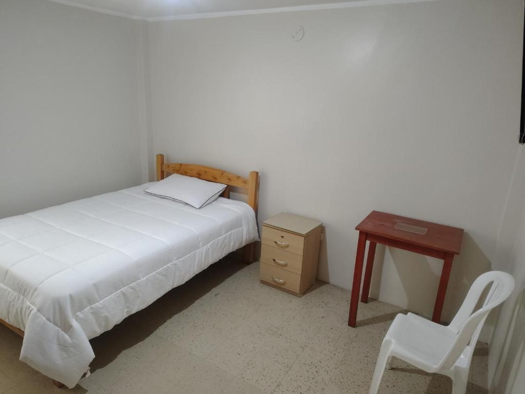 Postel nebo postele na pokoji v ubytování Claudia House Hz